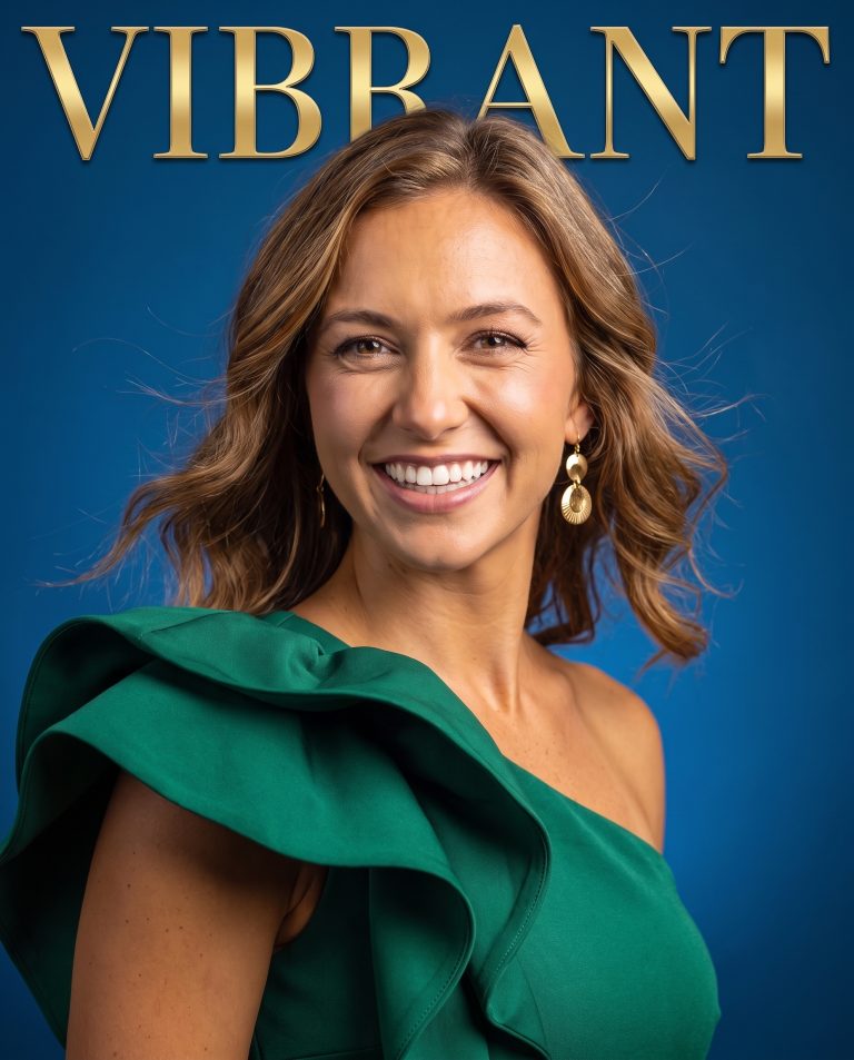 A guest is on a high-fashion studio cover shoot, a seamless studio backdrop in a rich saturated color.