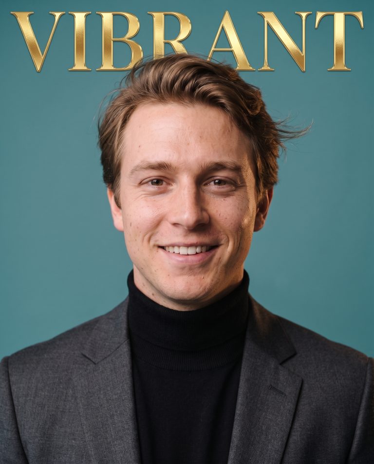 A guest is on a high-fashion studio cover shoot, a seamless studio backdrop in a rich saturated color.