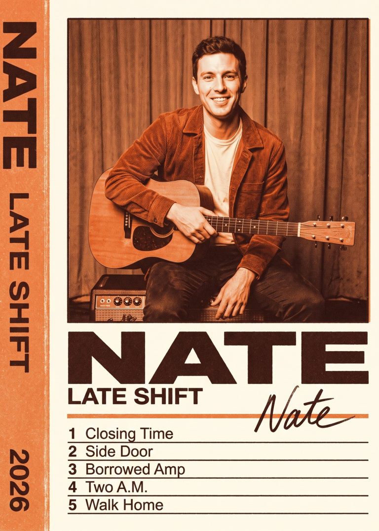 An orange and cream cassette-cover card of a man in a suede jacket playing an acoustic guitar on a small amp, with a five-song track list